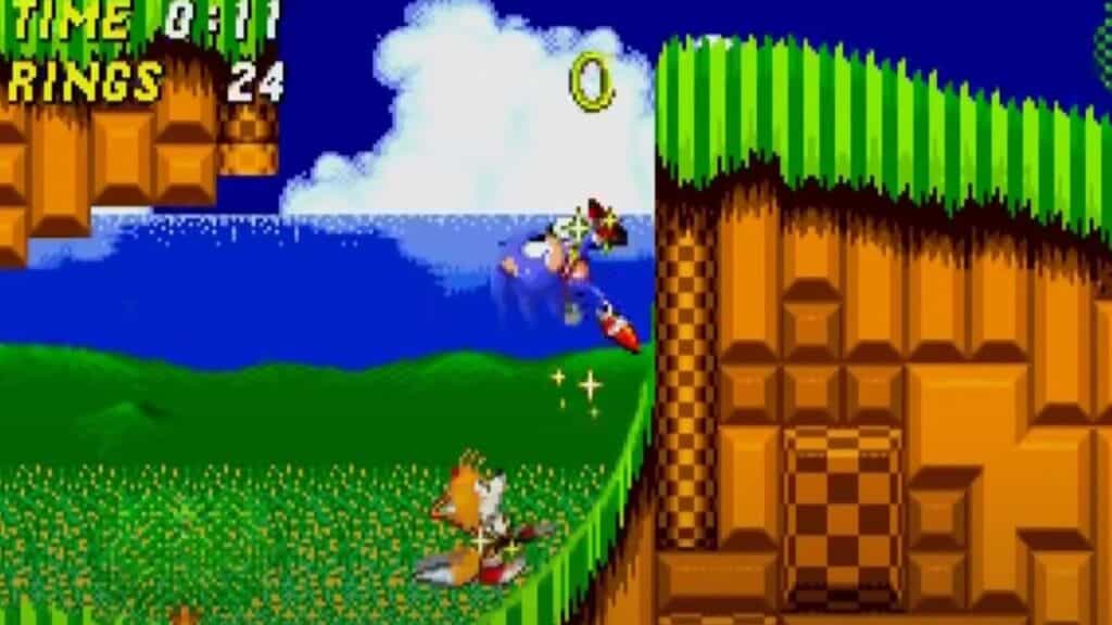 Pixelated video game siblings leap over a cliff in a grassy landscape under the clear blue sky.