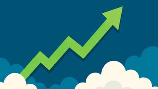 A green upward arrow zigzags above clouds, symbolizing growth or rising success in the world of tariffs and gaming, set against a blue background.